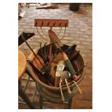 Plastic pot full of garden tools