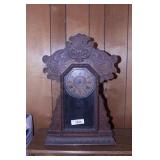 carved mantle clock