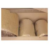 Several Rolls of Radiant Barrier Insulation