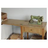 Singer Sewing Machine In Blonde Wood Cabinet