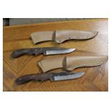 2 knives in leather sheaths