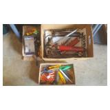 Shelf of Grease Guns, Razor Knives