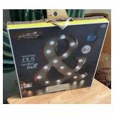 Lighted ampersand sign