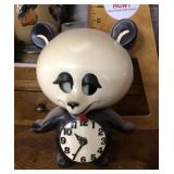 Electric panda bear clock