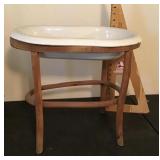 Porcelain baby bath with bentwood stand