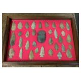 Arrowheads in glass display cabinet