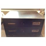 2-drawer metal cabinet full of watch parts
