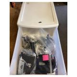 Sterilite tote of microscope parts