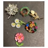 6 brooches