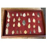 Arrowheads in glass display case