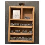 Printer's blocks in shadowbox drawer Printer's blocks in shadowbox drawer