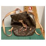 Louis Vuitton marked backpack bag