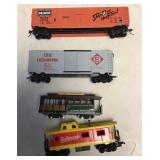 4 HO gauge cars