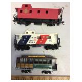 3 smaller train cars