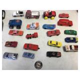 Group of Hot Wheel type cars and badge