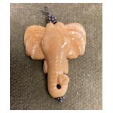 Carved elephant pendant