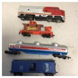 4 small gauge train cars