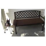 Bench and dog yard art on front porch Bench and dog yard art on front porch