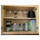 Contents of upper kitchen cabinet with canisters Contents of upper kitchen cabinet with canisters