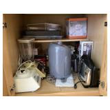Lower kitchen cabinet with small appliances Lower kitchen cabinet with small appliances