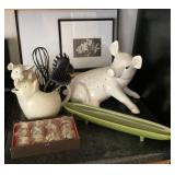 Contents on counter with pig decor Contents on counter with pig decor