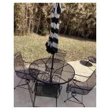 Metal mesh patio table, 4 chairs, umbrella Metal mesh patio table, 4 chairs, umbrella