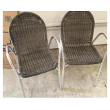 Pair of woven stacking chairs