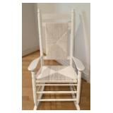 White rocker with rush seat and back