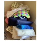 Large pile of soft goods