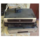 Stack of vintage electronics