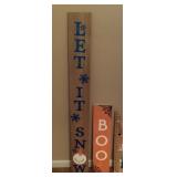 2 wooden seasonal porch signs