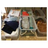 6 plastic storage bins full of fabric scraps