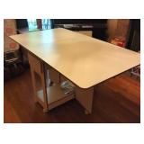 40" x 72" Folding sewing table on casters