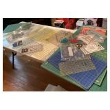 Collection of rotary cutting mats and rules