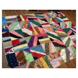 77x95 Crazy quilt with satin backing