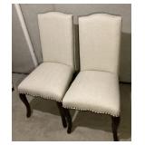 Pair of upholstered high back side chairs