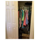 Contents of bedroom closet with women