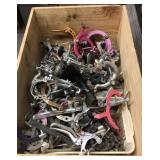 Wine box full of bicycle brake assemblies & chains