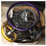 Box full of bicycle gears and wheels