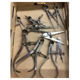 Flat of compasses and calipers