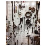 Contents of pegboard with hand tools
