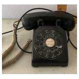 Black rotary desktop phone