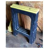 Pair of plastic sawhorses and workmate