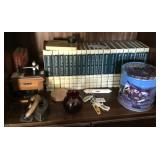 Contents of shelf with encyclopedias