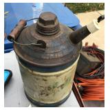 Vintage gasoline can with wooden handle