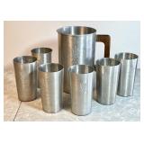West Bend aluminum pitcher and 6 tumblers