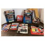 Group of diecast vehicles on cards