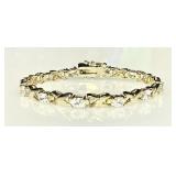 Gold over sterling X bracelet with clear stones