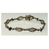 Gold over sterling bracelet with blue stones