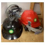 Group of 12 new hard hats with BP logo